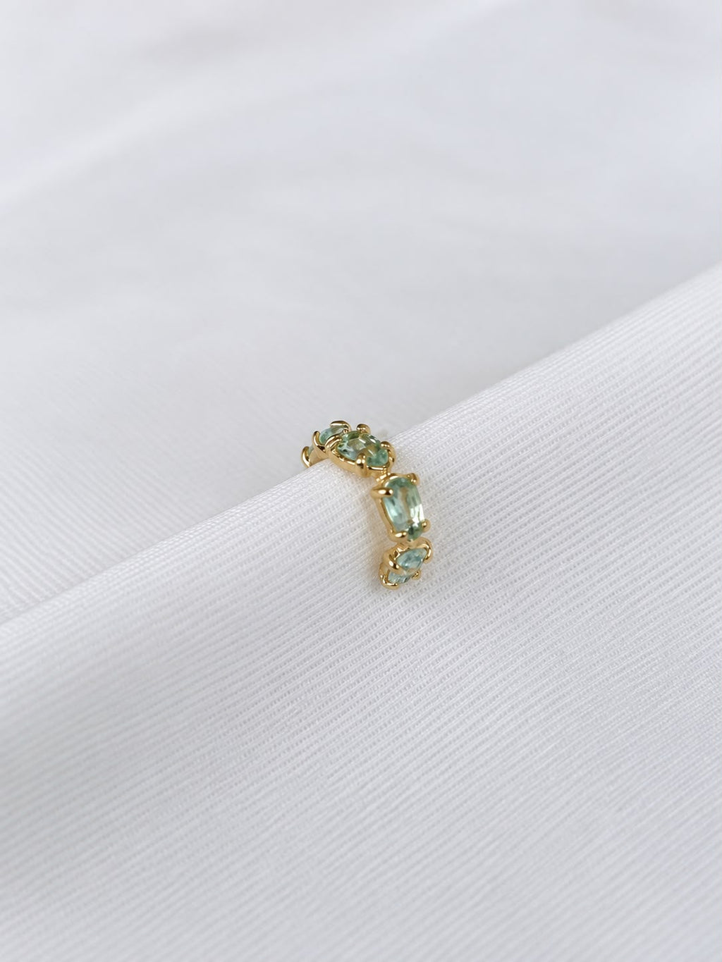 Piercing água marinha