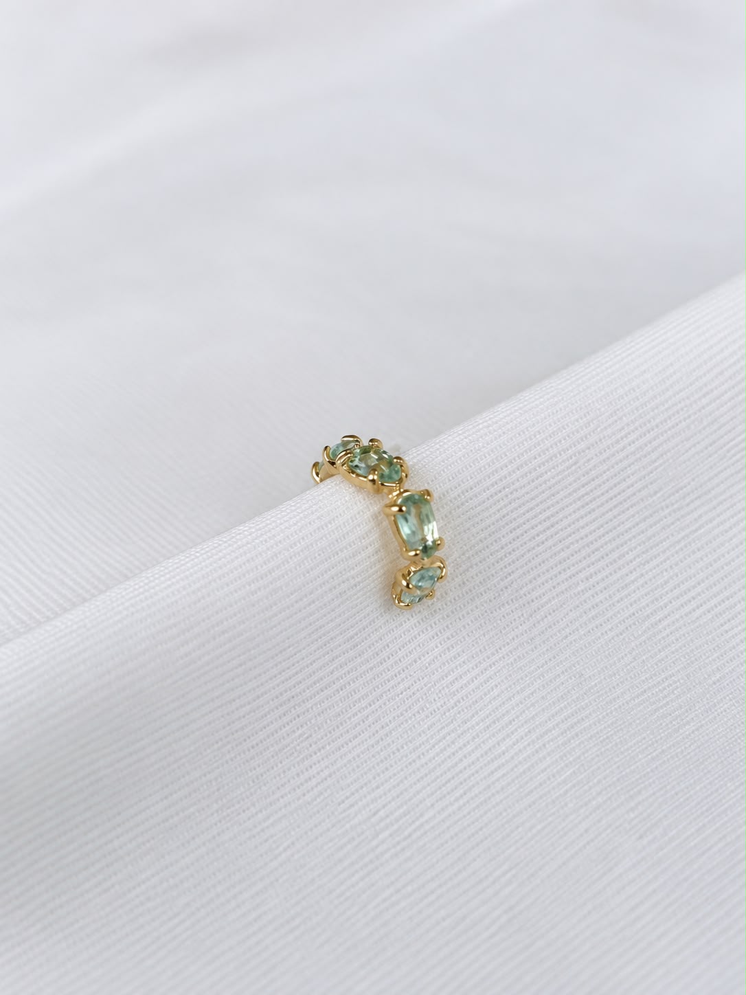 Piercing água marinha